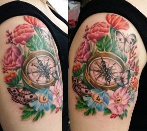 The Ace and Sword Tattoo Parlour Etobicoke Longbranch Toronto Tattoo by Laura-Compass and Flowers on Shoulder