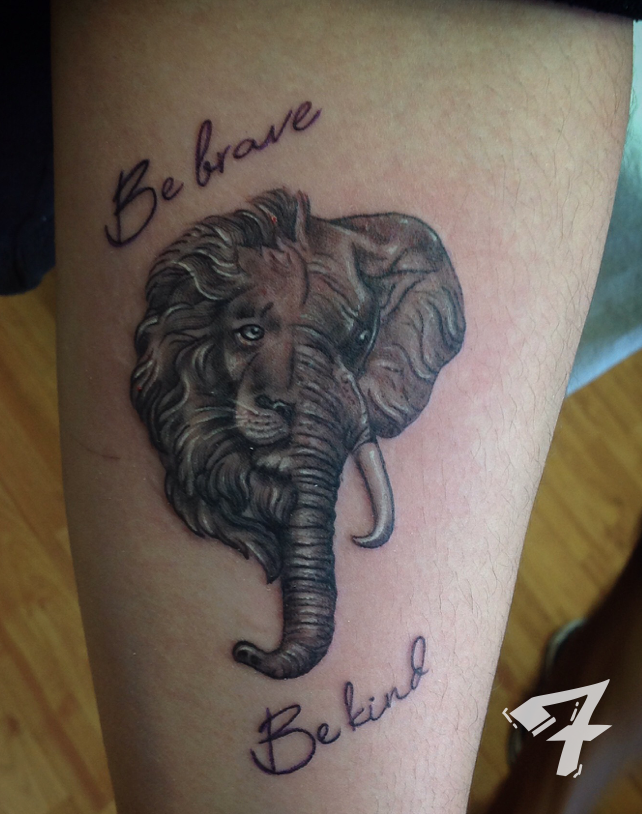 Black and grey microrealist lion and elephant tattoos